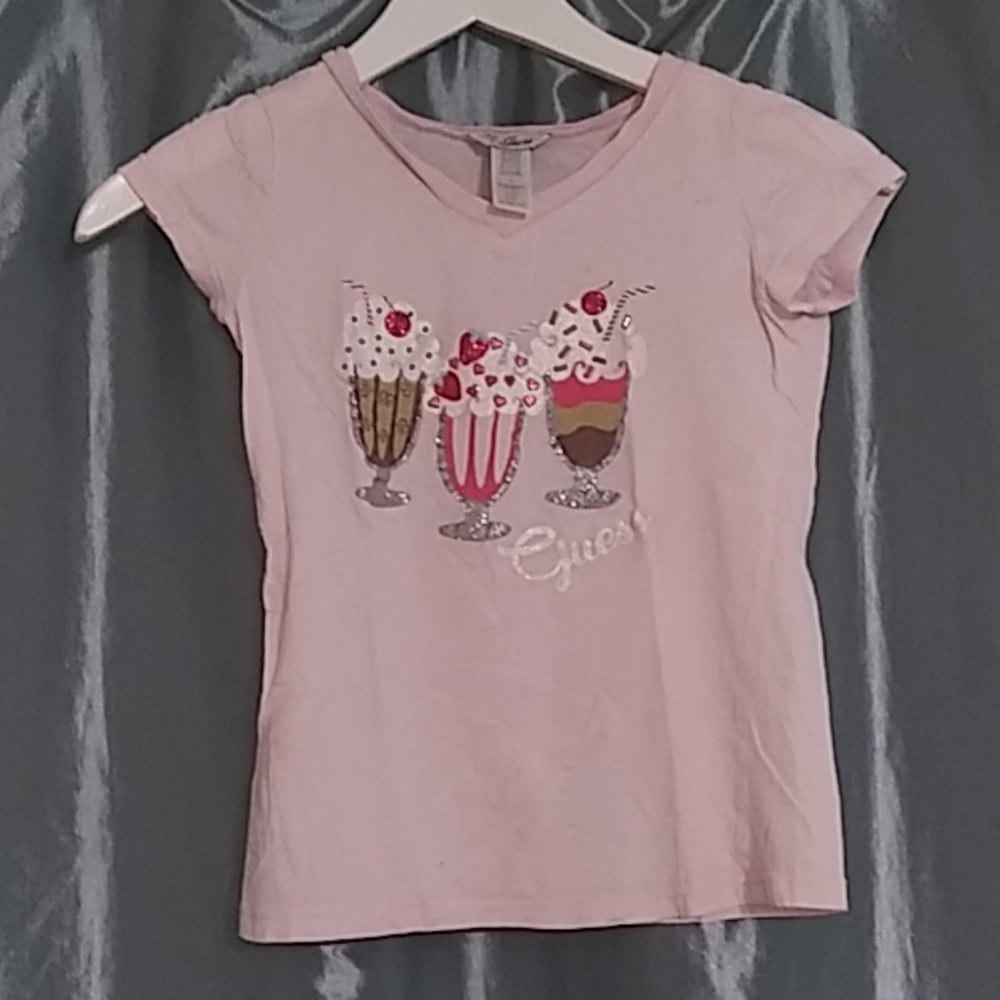 A pink shirt with milkshakes